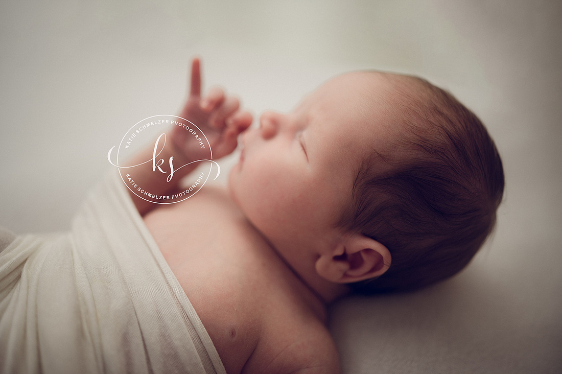 Studio Newborn Session with new Family of Three photographed by IA Newborn Photographer KS Photography