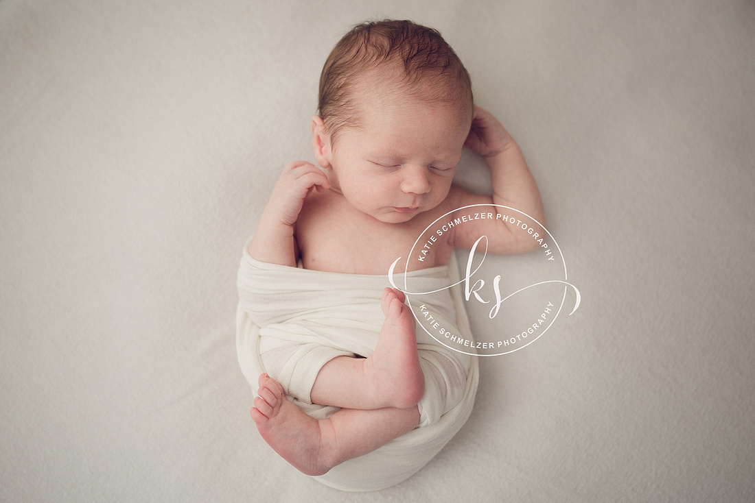 Studio Newborn Session with new Family of Three photographed by IA Newborn Photographer KS Photography