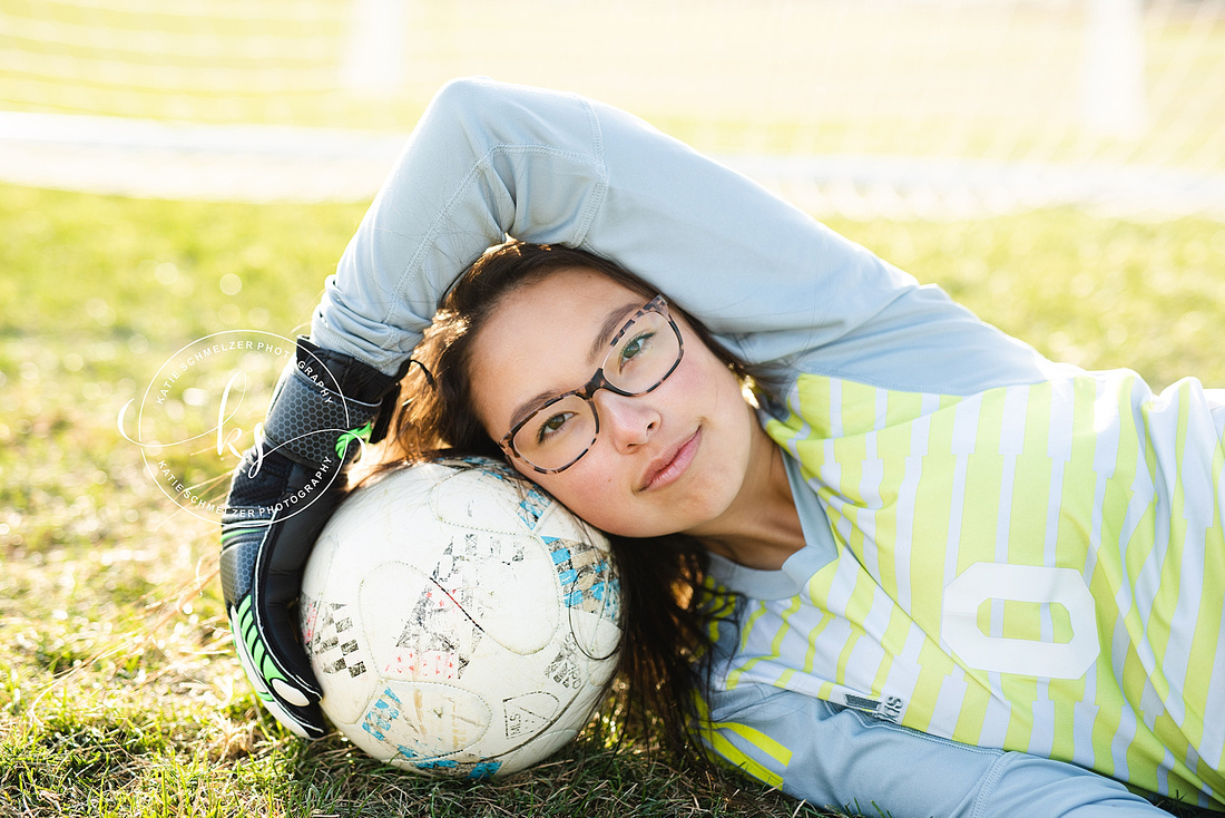 Tiffin IA Senior portraits with soccer player photographed by KS Photography