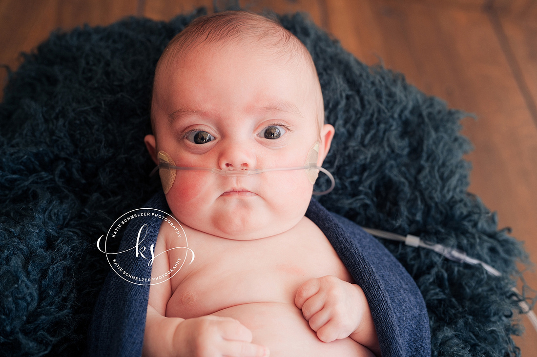 Baby boy Warrior Newborn Session photographed by Iowa newborn Photographer KS Photography