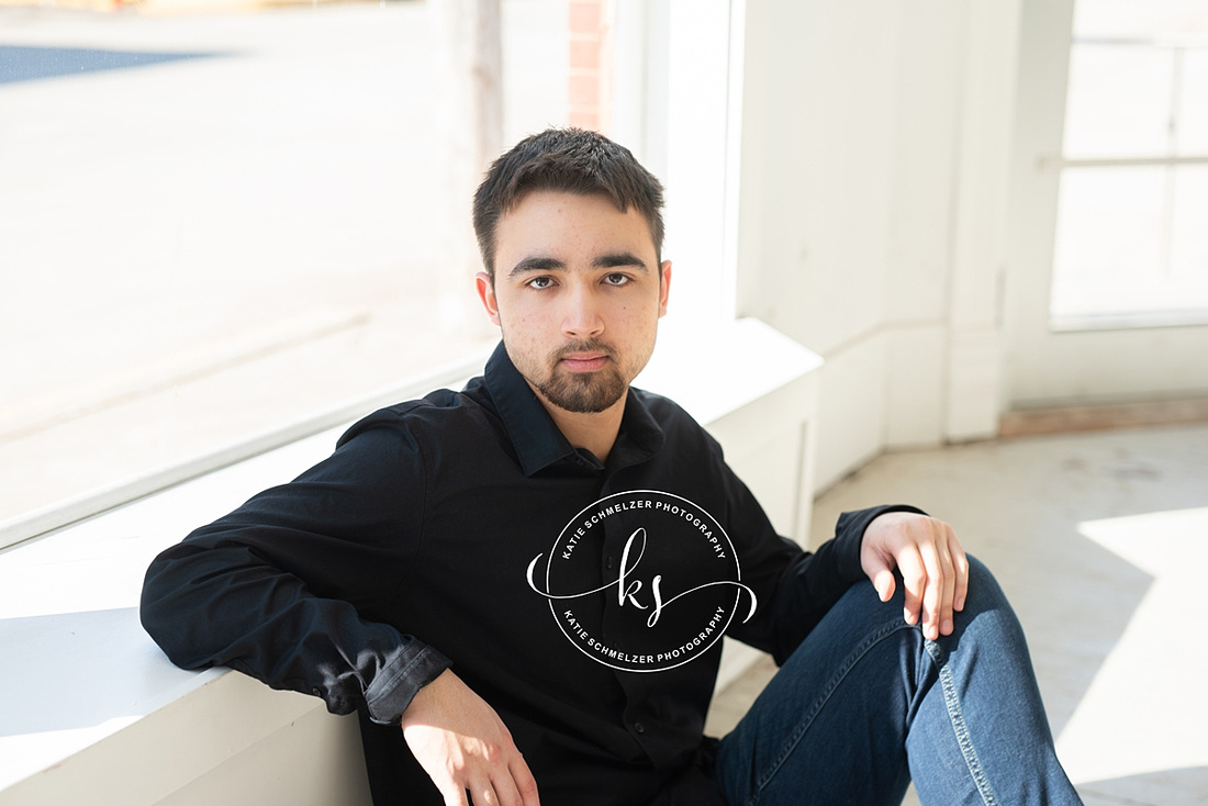 Iowa Senior portrait session of High school boy in studio photographed by IA Senior Photographer KS Photography