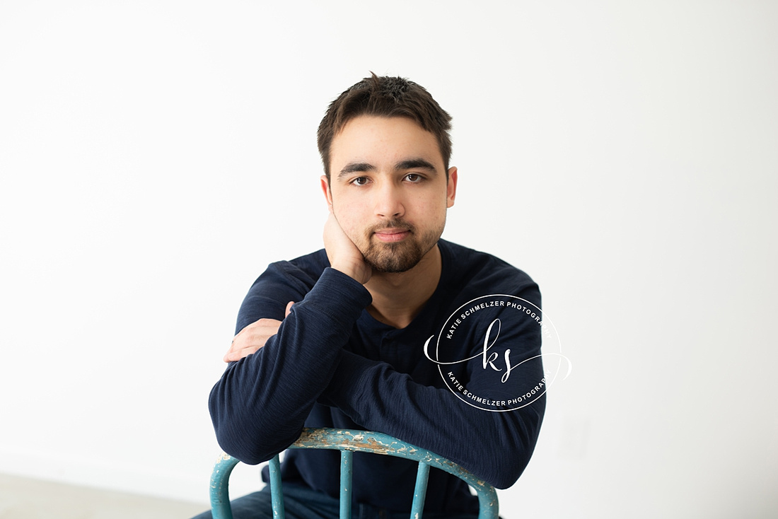 Iowa Senior portrait session of High school boy in studio photographed by IA Senior Photographer KS Photography