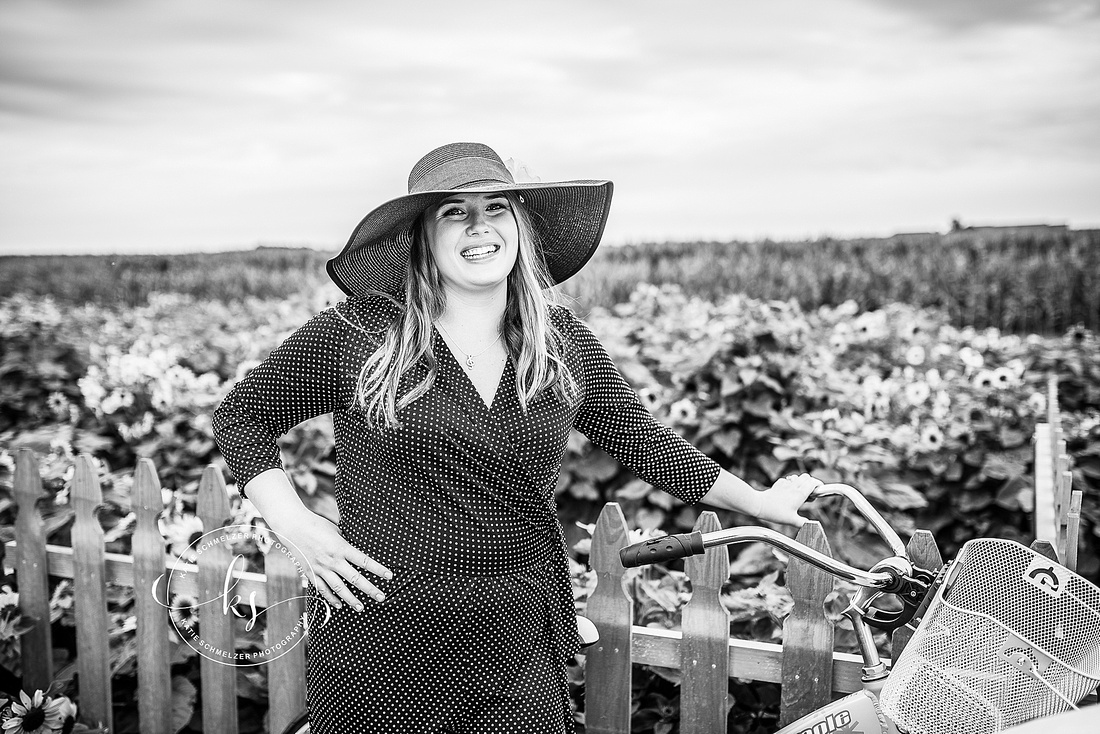 Senior portraits in sunflower fields of Colony Pumpkin Patch by KS Photography