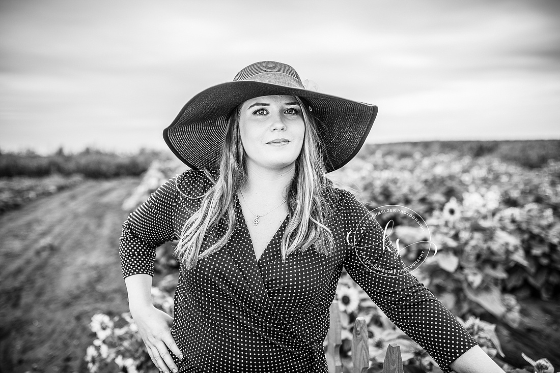 Senior portraits in sunflower fields of Colony Pumpkin Patch by KS Photography