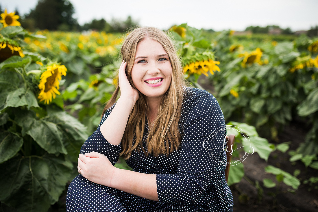 Senior portraits in sunflower fields of Colony Pumpkin Patch by KS Photography