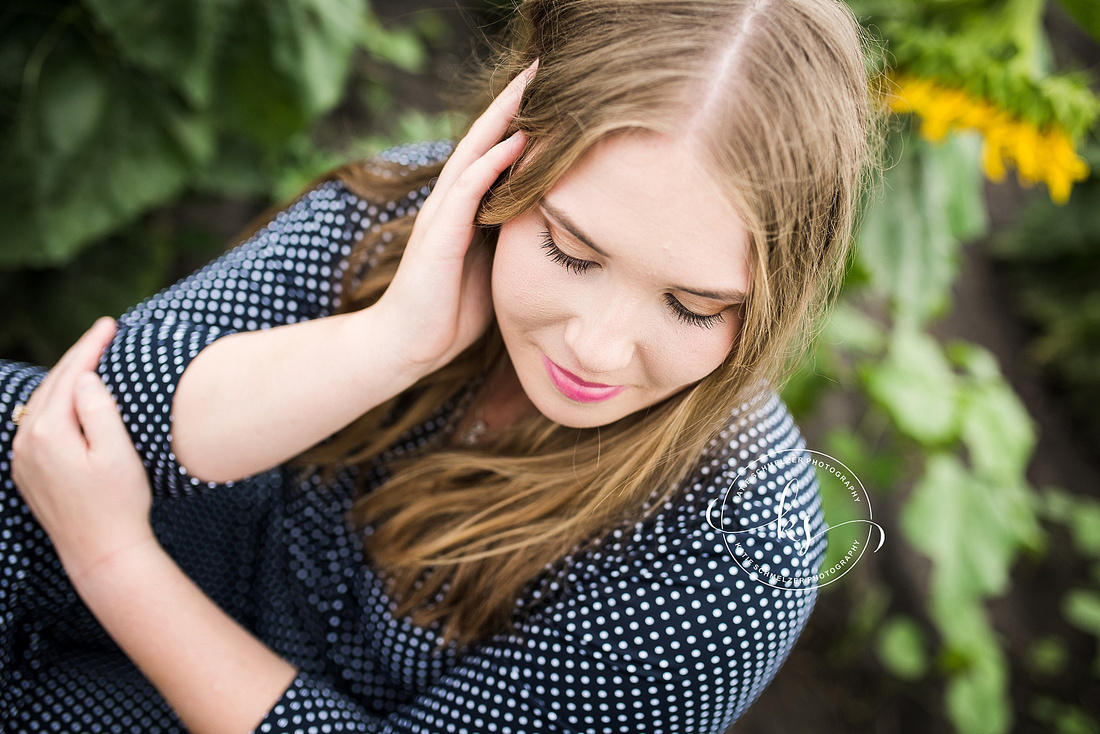 Senior portraits in sunflower fields of Colony Pumpkin Patch by KS Photography