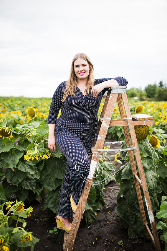 Senior portraits in sunflower fields of Colony Pumpkin Patch by KS Photography