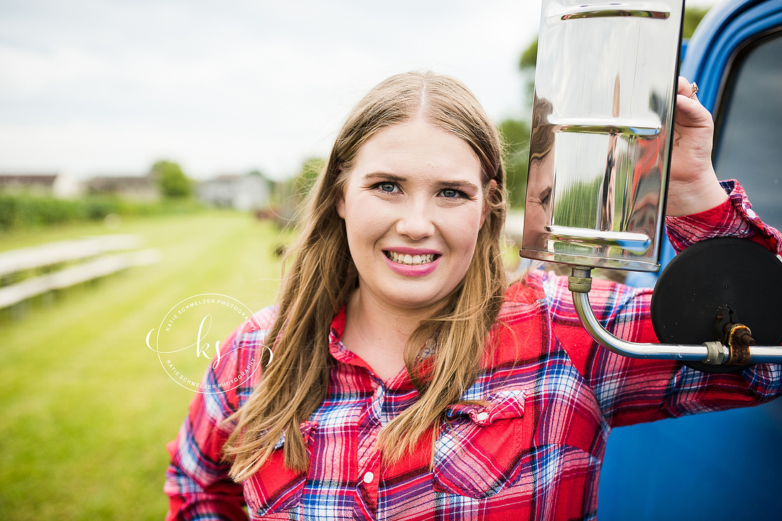 Senior portraits in sunflower fields of Colony Pumpkin Patch by KS Photography