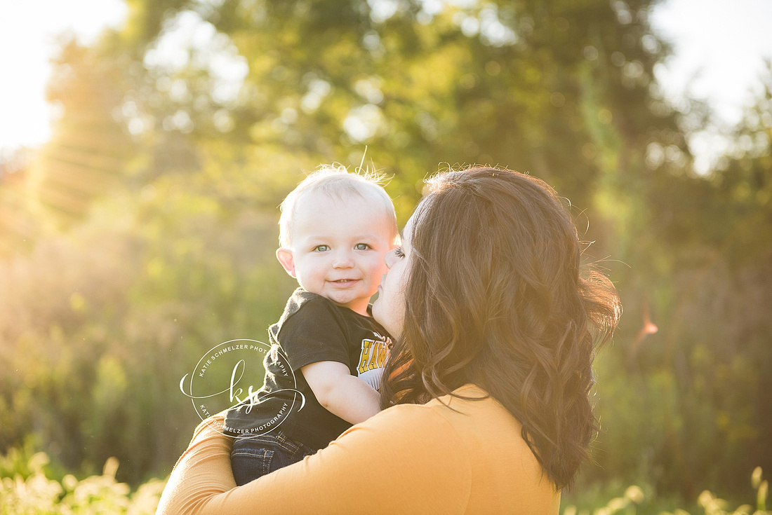 Cookie session for one year old with sunset family portraits by Iowa family photographer KS Photography