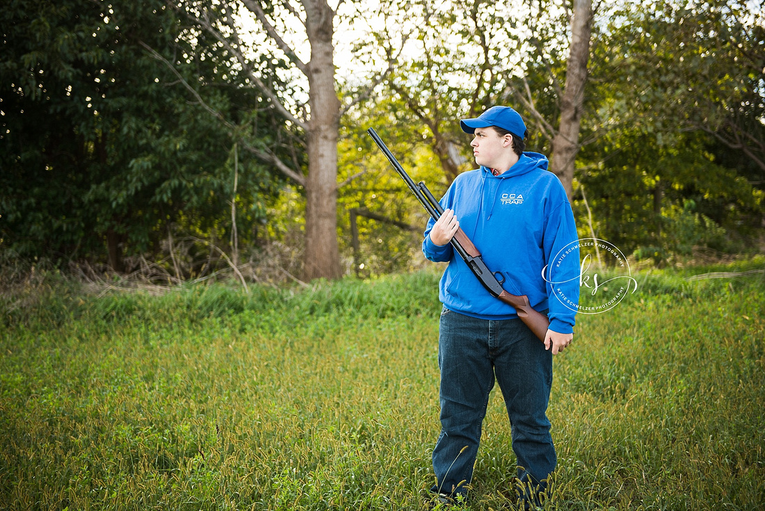 Senior portraits on family farm in Iowa with KS Photography