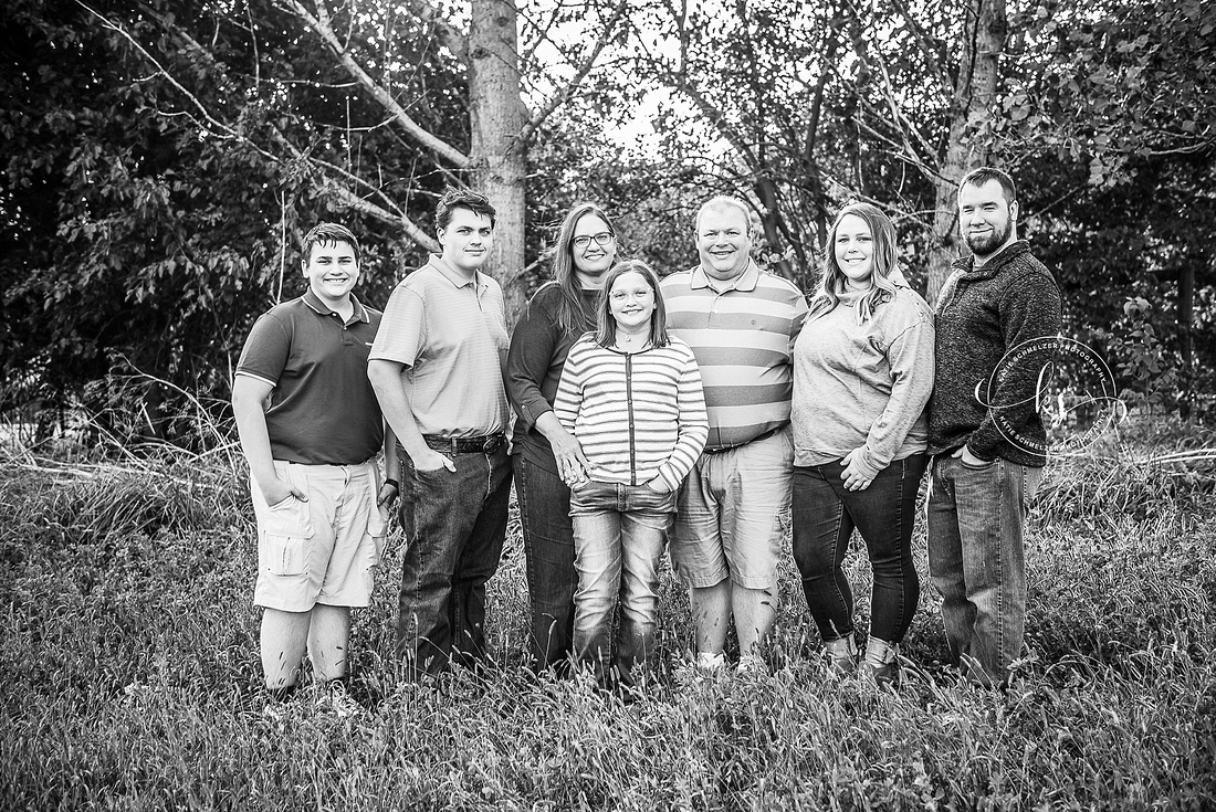 Senior portraits on family farm in Iowa with KS Photography