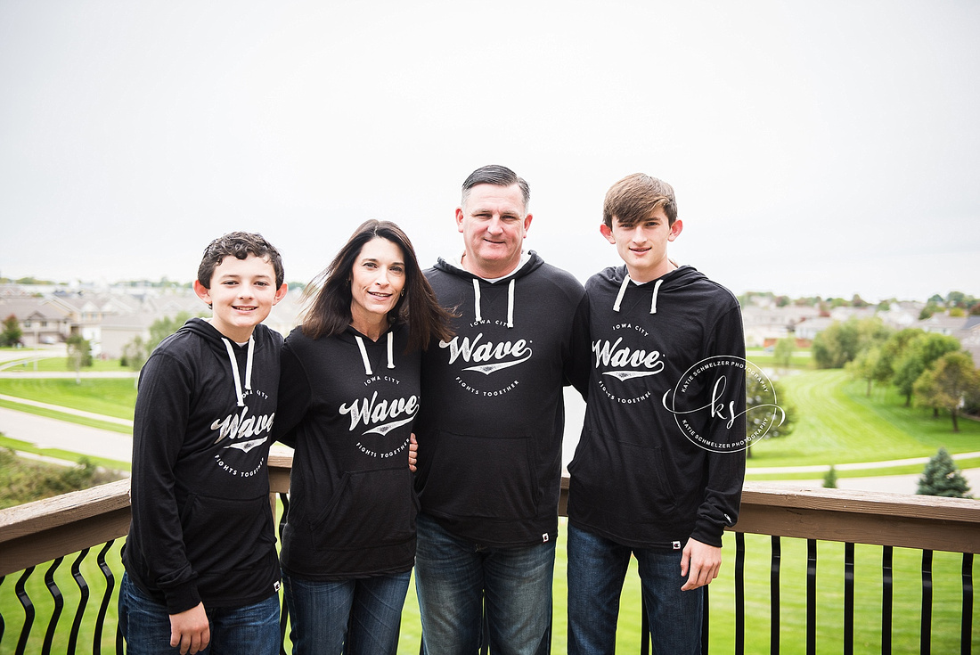 Iowa Family portraits with WAVE shirts and white dogs by KS Photography