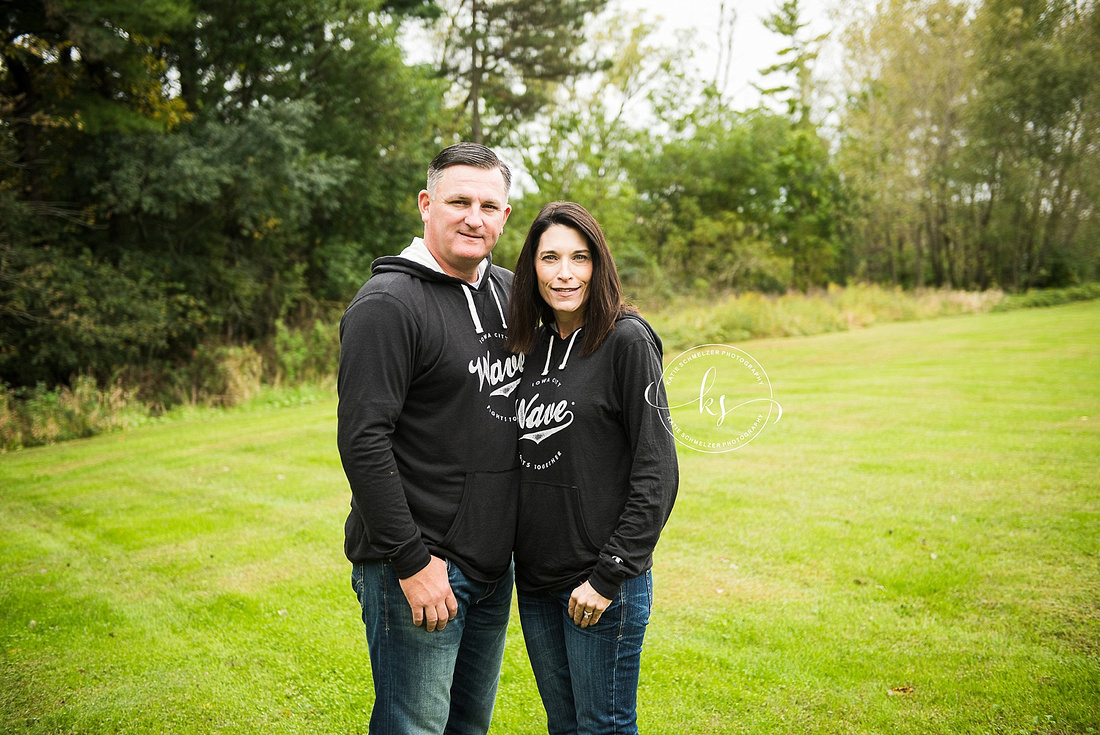 Iowa Family portraits with WAVE shirts and white dogs by KS Photography