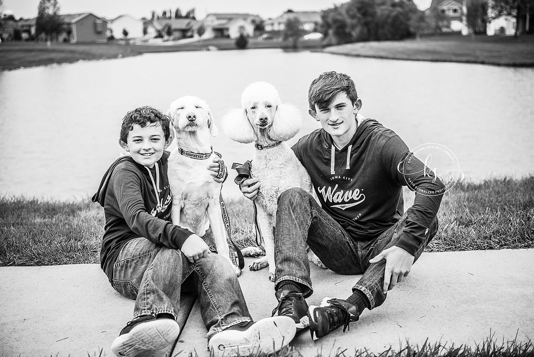 Iowa Family portraits with WAVE shirts and white dogs by KS Photography