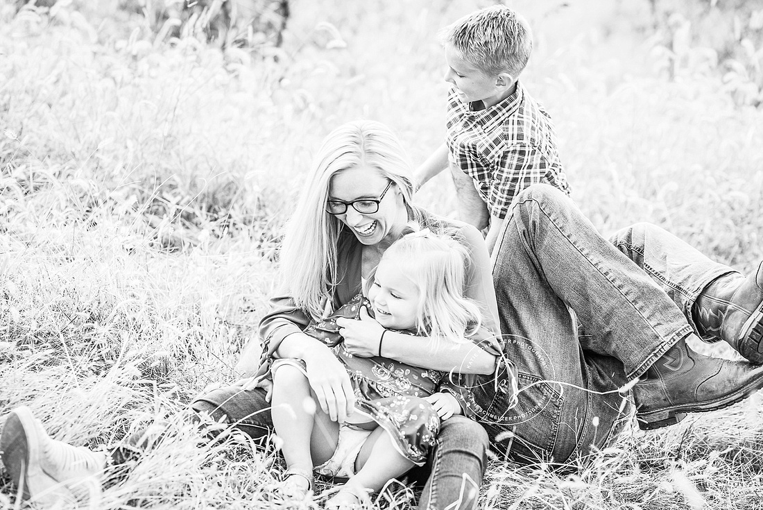 Joyful family portraits at sunset in Iowa with KS Photography