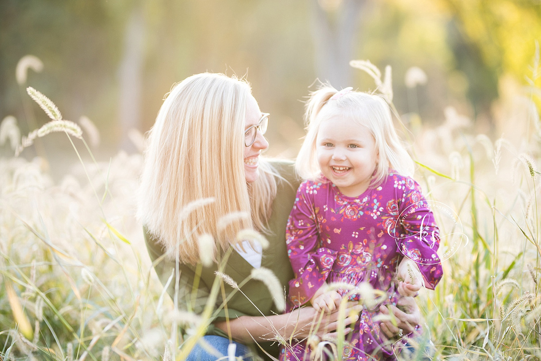 Joyful family portraits at sunset in Iowa with KS Photography