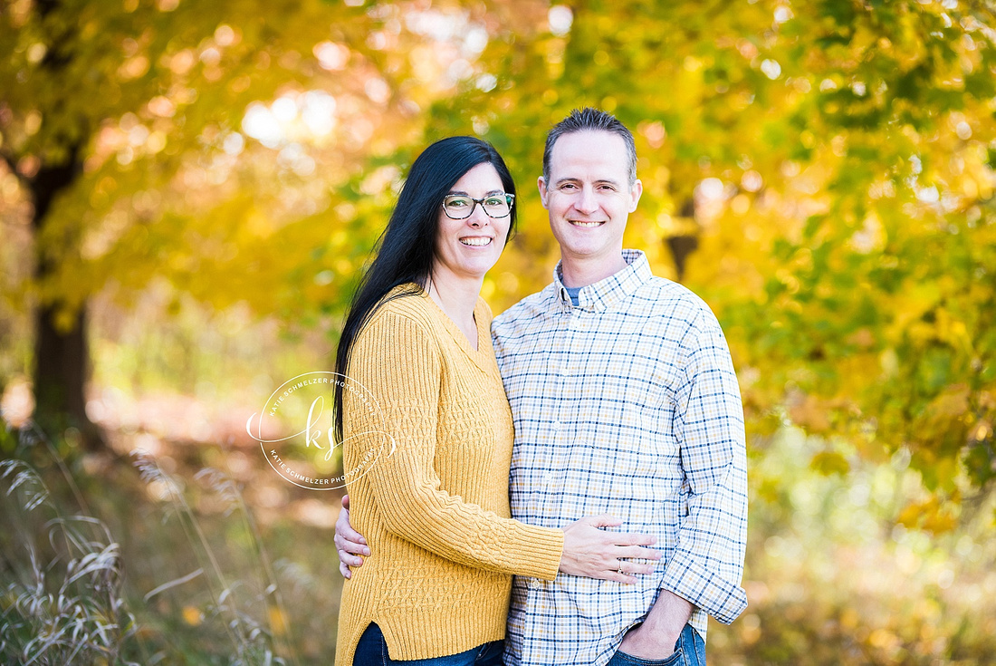 Fall family portraits with color scheme of blue, gold, and grey by Iowa family photographer KS Photography