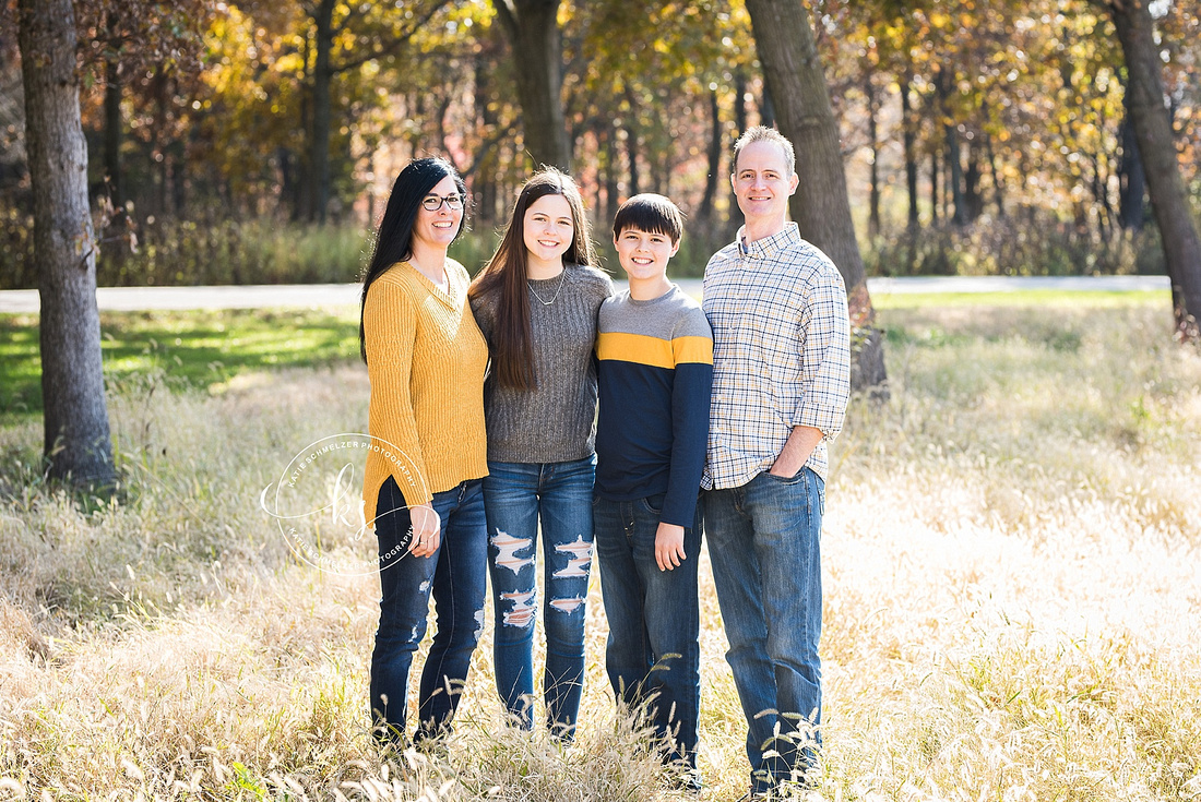 Fall family portraits with color scheme of blue, gold, and grey by Iowa family photographer KS Photography