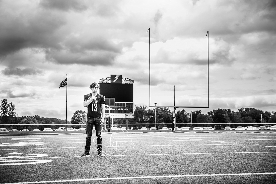 Senior portraits with high school athlete and KS Photography in Tiffin, IA 