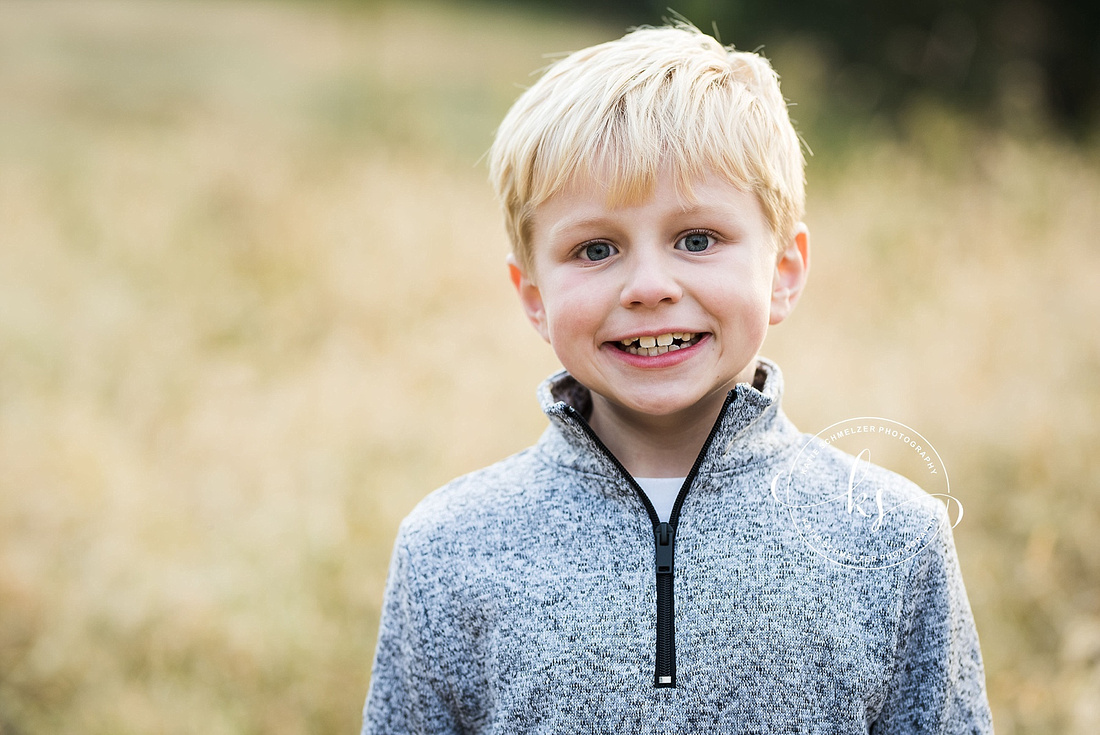 Tiffin Iowa family portrait session with two young boys in the fall with KS Photography