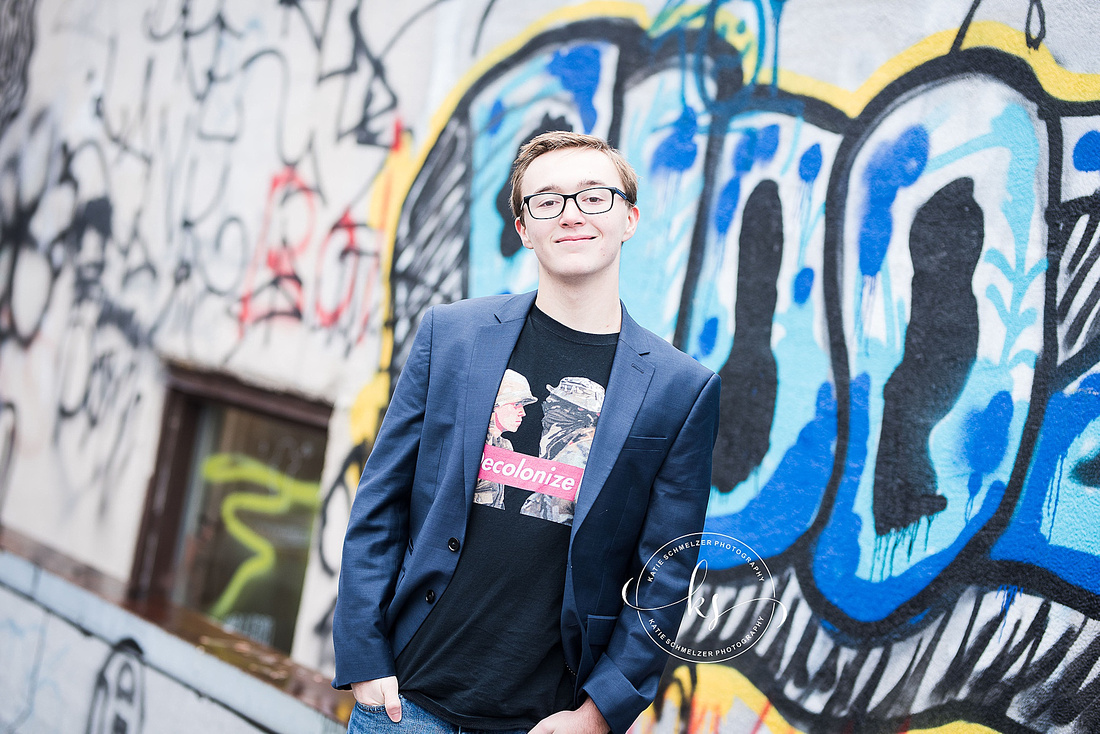 Iowa senior portraits with student in decolonize shirt photographed by KS Photography