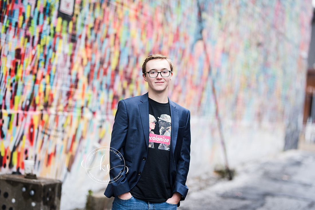 Iowa senior portraits with student in decolonize shirt photographed by KS Photography