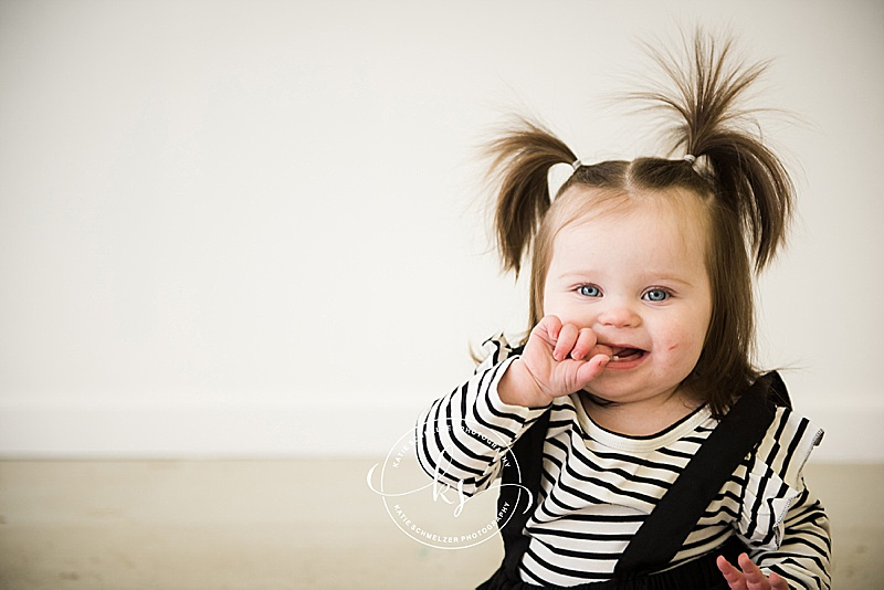 First birthday portraits for baby girl in downtown studio with Iowa family photographer KS Photography