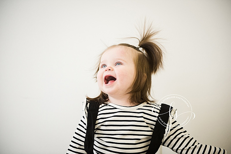 First birthday portraits for baby girl in downtown studio with Iowa family photographer KS Photography