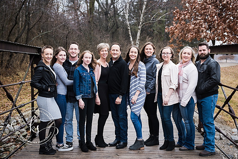 Rainy fall family portraits with Iowa family photographer and family with 6 children