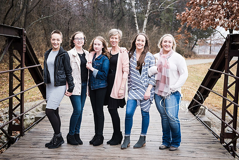 Rainy fall family portraits with Iowa family photographer and family with 6 children