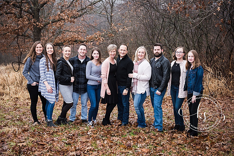 Rainy fall family portraits with Iowa family photographer and family with 6 children