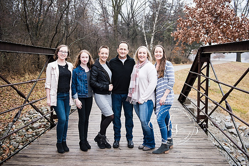 Rainy fall family portraits with Iowa family photographer and family with 6 children