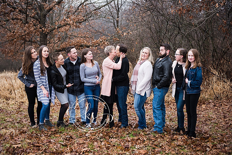 Rainy fall family portraits with Iowa family photographer and family with 6 children