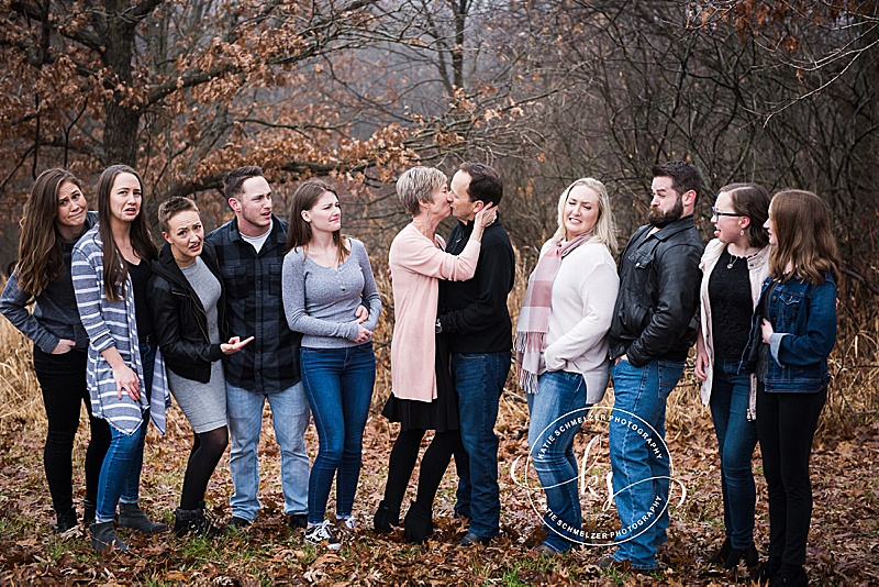 Rainy fall family portraits with Iowa family photographer and family with 6 children