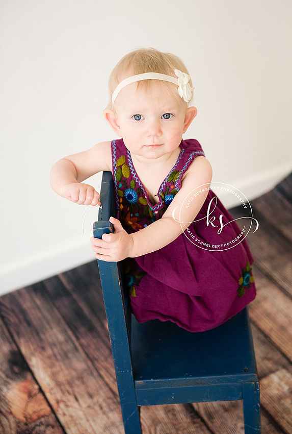 Studio portraits in Tiffin, Iowa for baby girl's first birthday by KS Photography