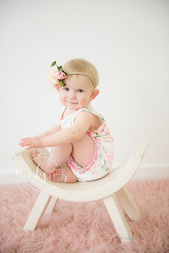 Studio portraits in Tiffin, Iowa for baby girl's first birthday by KS Photography