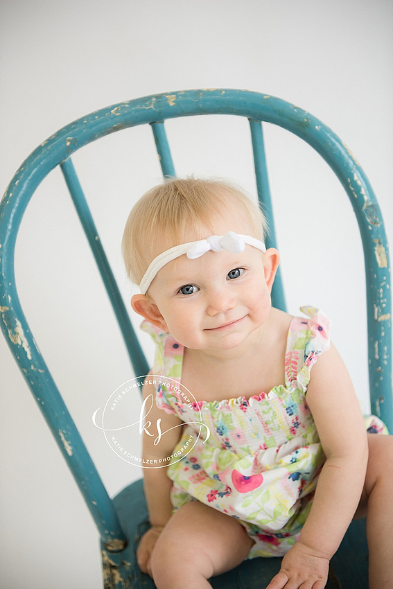 Studio portraits in Tiffin, Iowa for baby girl's first birthday by KS Photography