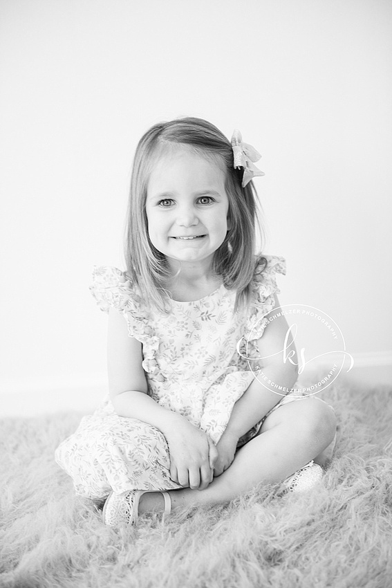 Studio portraits in Tiffin, Iowa for baby girl's first birthday by KS Photography