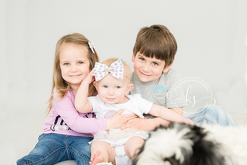 Studio portraits in Tiffin, Iowa for baby girl's first birthday by KS Photography