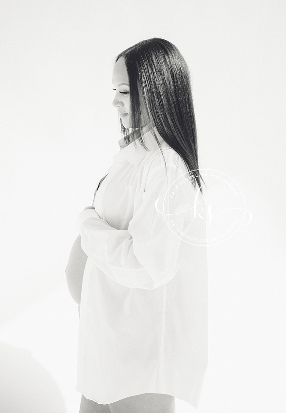 Classic summer maternity session in Iowa field with mom in white gown photographed by Tiffin IA photographer, KS Photography.