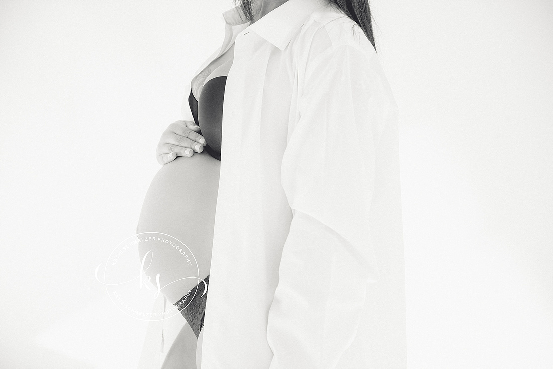 Classic summer maternity session in Iowa field with mom in white gown photographed by Tiffin IA photographer, KS Photography.