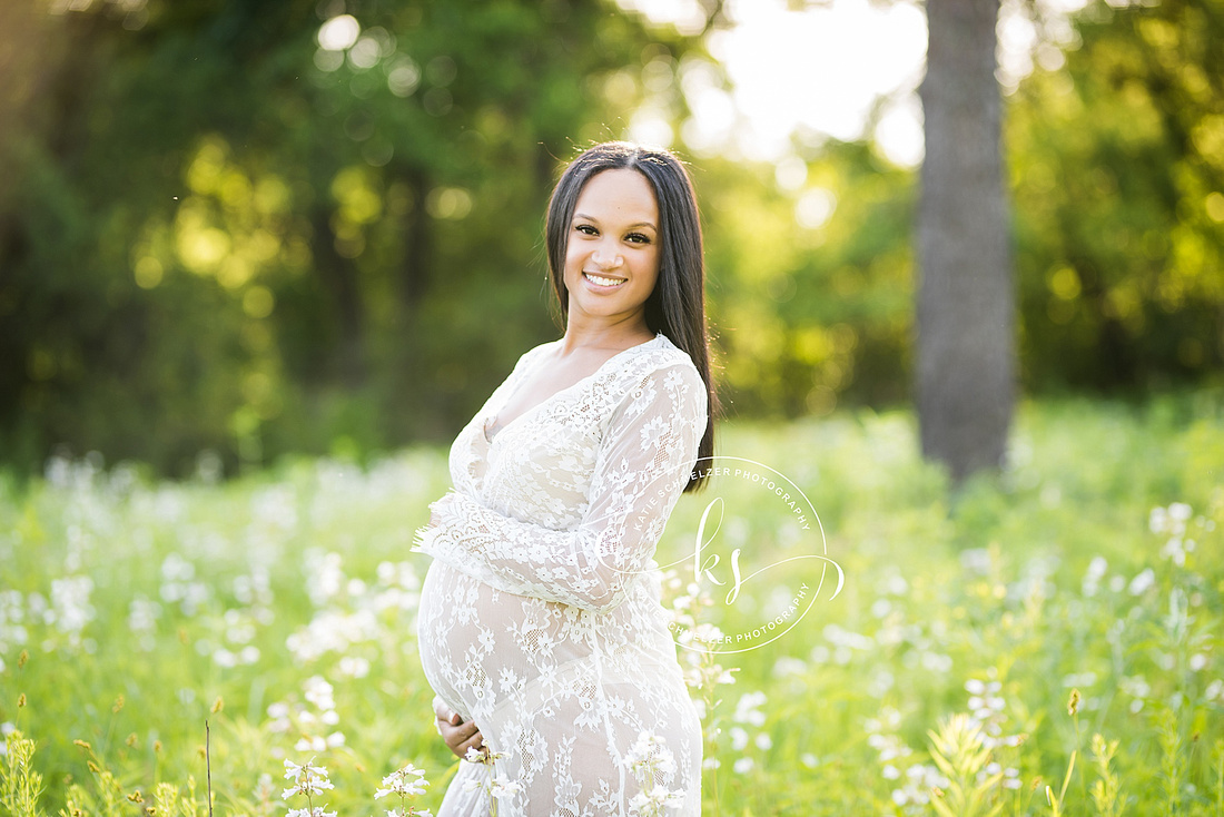 Classic summer maternity session in Iowa field with mom in white gown photographed by Tiffin IA photographer, KS Photography.