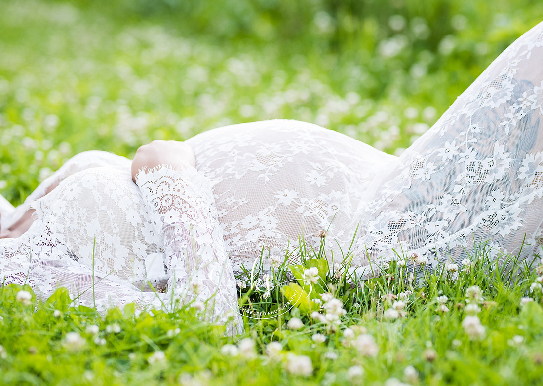 Classic summer maternity session in Iowa field with mom in white gown photographed by Tiffin IA photographer, KS Photography.