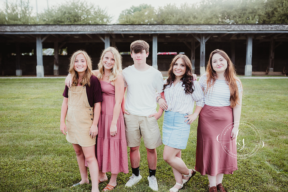 Sunset family portraits on farm in Tiffin IA with KS Photography