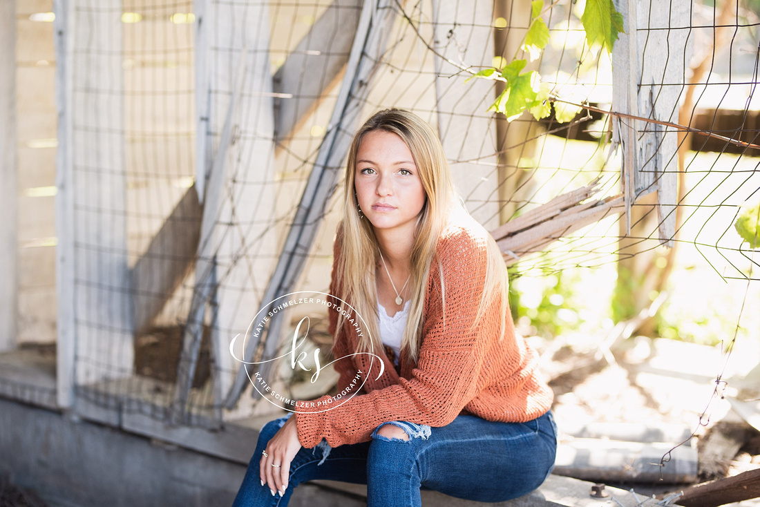 Senior portraits with soccer star in Tiffin IA photographed by KS Photography