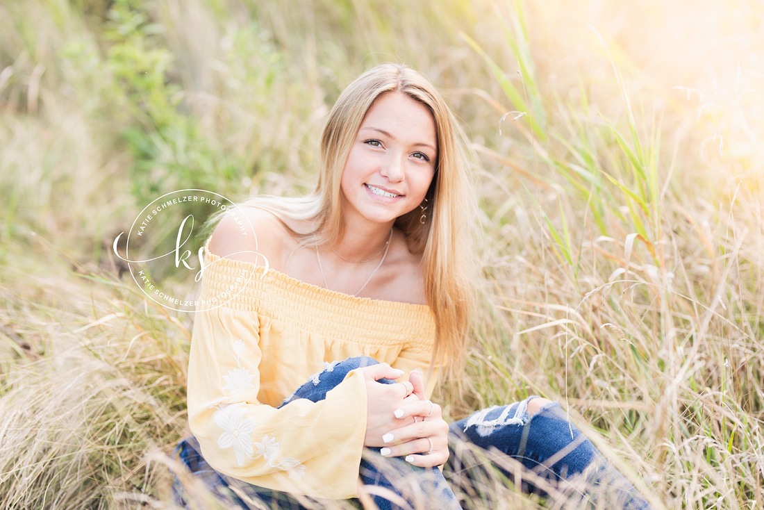 Senior portraits with soccer star in Tiffin IA photographed by KS Photography