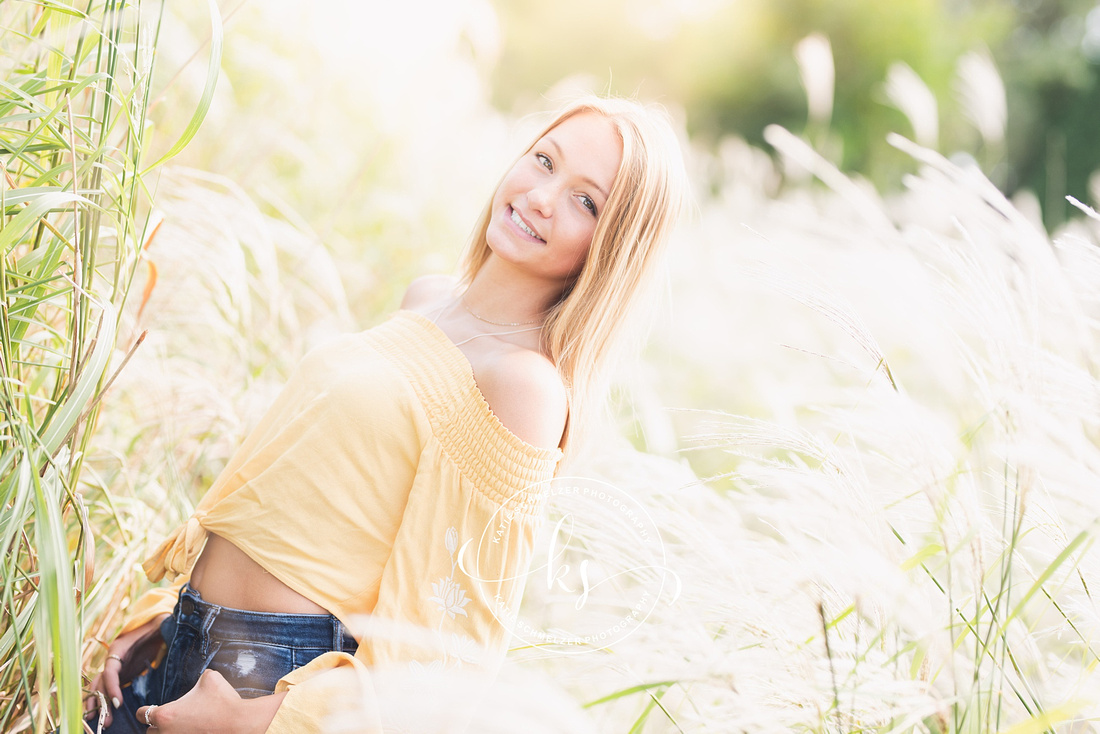 Senior portraits with soccer star in Tiffin IA photographed by KS Photography