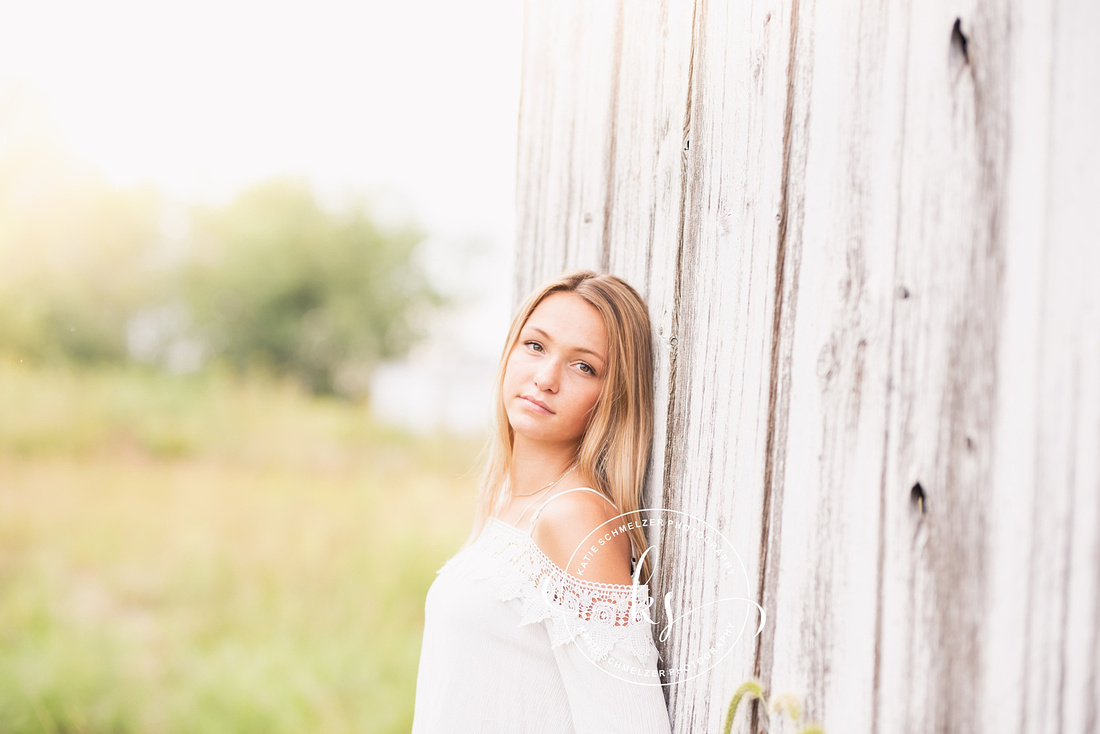 Senior portraits with soccer star in Tiffin IA photographed by KS Photography