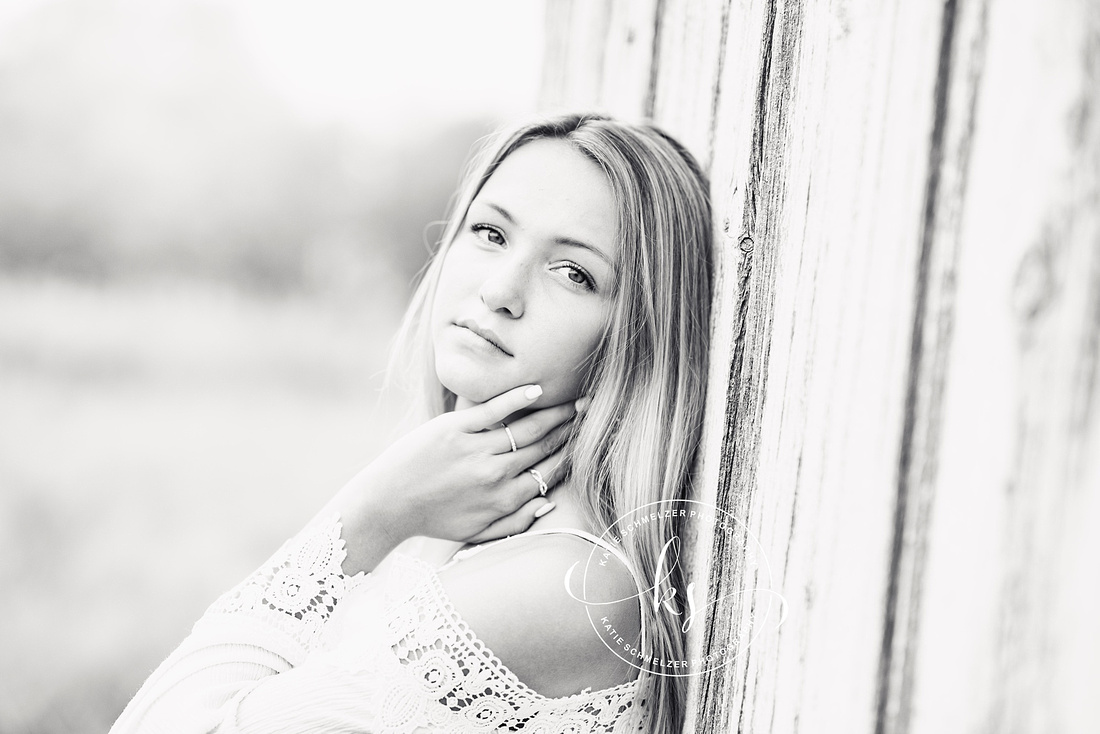 Senior portraits with soccer star in Tiffin IA photographed by KS Photography