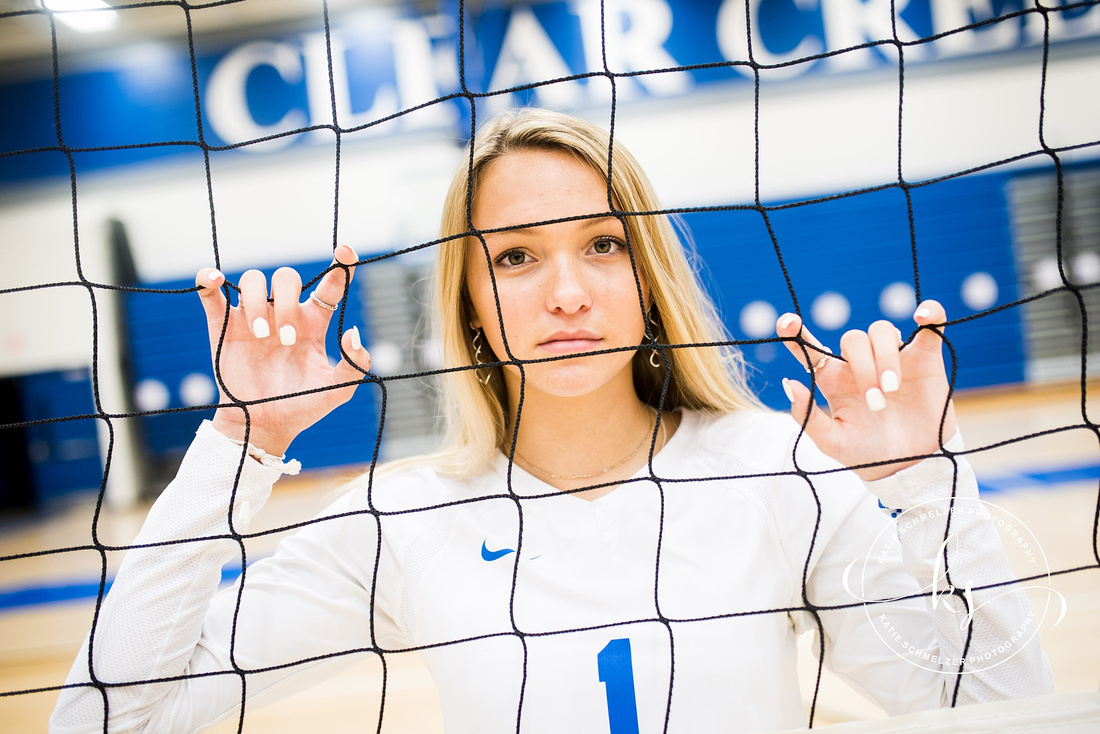 Senior portraits with soccer star in Tiffin IA photographed by KS Photography